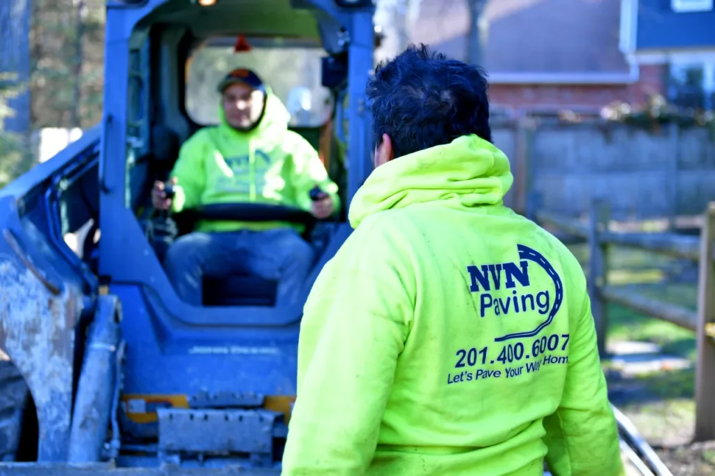 NVN Paving crew performing asphalt site work for a residential paving project in Bergen County, NJ.