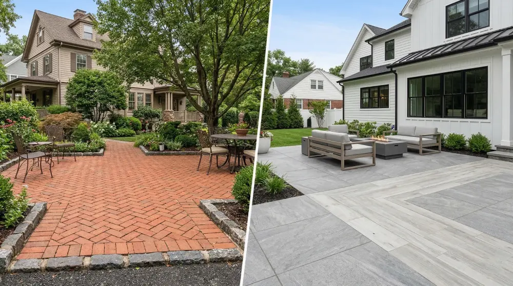 A split-screen photograph comparing two distinct backyard patio paving options for homes in Franklin Lakes and Saddle River, NJ. The left side shows a traditional Victorian-style patio featuring red clay brick pavers laid in a herringbone pattern, bordered by rugged granite cobblestones. The right side displays a sleek, Modern Farmhouse-style patio with oversized, gray large-format porcelain slabs transitioning into wood-look porcelain planks. Both patios showcase professional design and paving solutions by a New Jersey-based company.