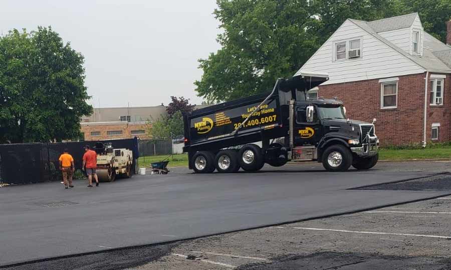 commercial parking lot paving truck and equipment somerest