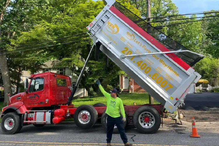 NVN Paving truck and crew working on a driveway project in New Jersey highlighting different county and city permit requirements