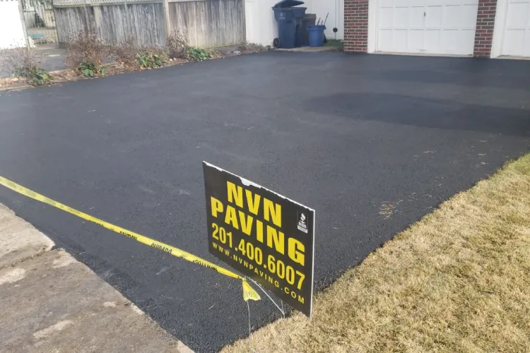 Freshly paved asphalt driveway by NVN Paving in New Jersey showing when permits may be required for repaving or new installation