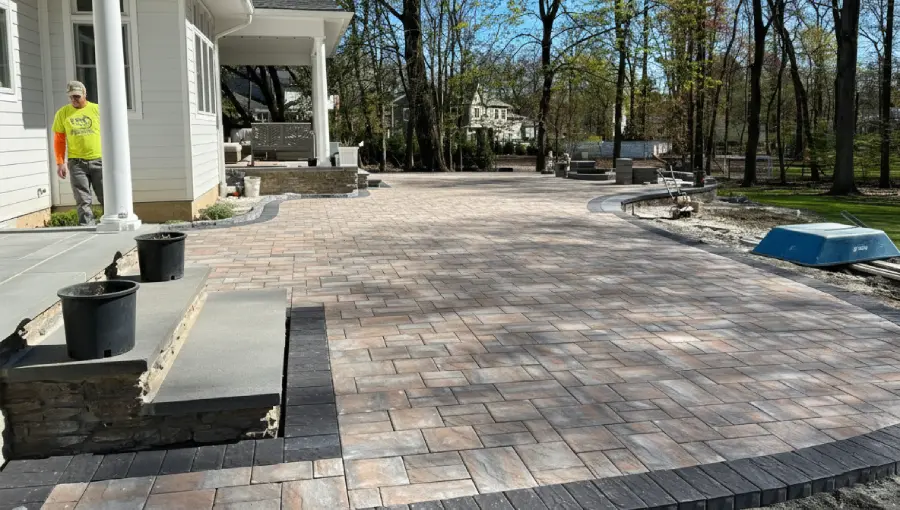 NVN Professional contractors laying down high-quality hot-mix asphalt on a new driveway in Somerset County, NJ.